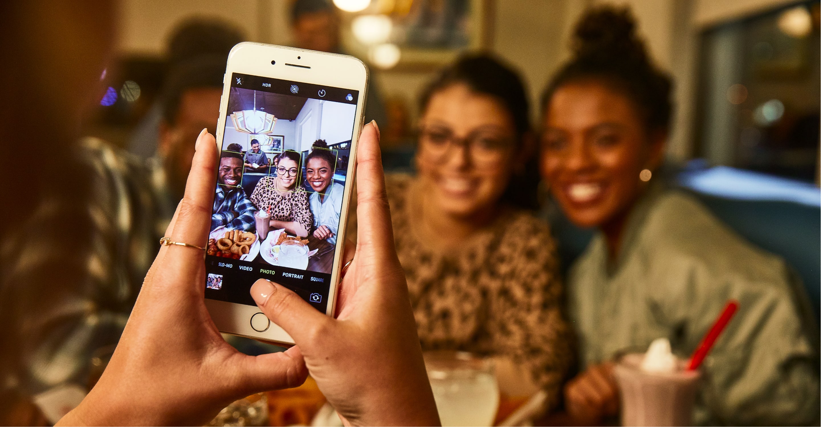 Taking a selfie with friends at the Den by dennys