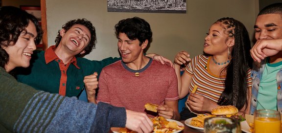 Group of college age people at a table