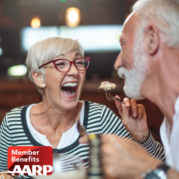 Denny's AARP image with man and woman eating pancakes